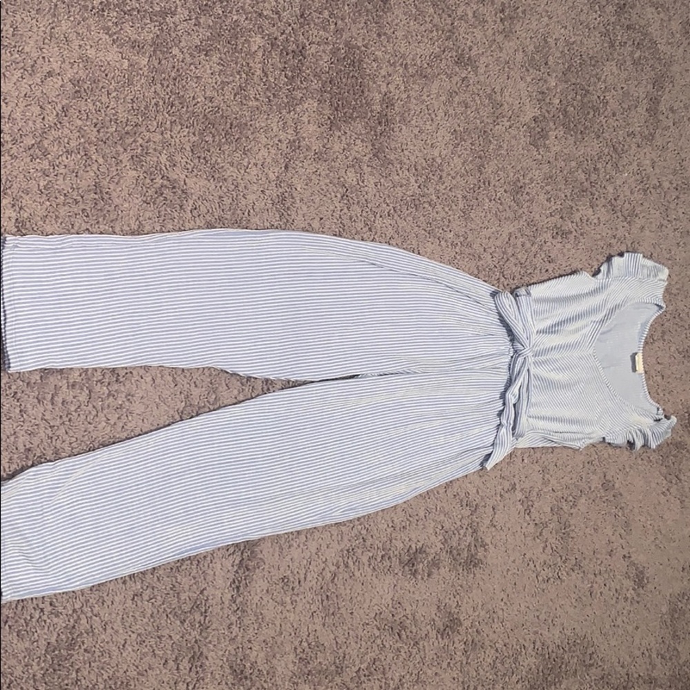 Blue and white striped v neck romper with belt.